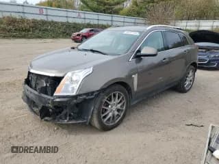 ✅ 2014 Cadillac SRX Performance Collection • VIN: 3GYFNFE3XES667623 • Lot: 86767115. Listed on Copart with 121,304 mi. Free auction sales archive from the USA and detailed vehicle history report at DreamBid. Image 1.