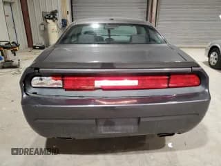 ✅ 2014 Dodge Challenger SXT • VIN: 2C3CDYAG9EH133472 • Lot: 44821425. Wystawiony na Copart z przebiegiem 132 298 mil. Bezpłatny archiwum sprzedaży aukcyjnych z USA i szczegółowy raport historii pojazdu na DreamBid. Zdjęcie 6.