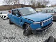 ✅ 2024 Rivian R1T Adventure • VIN: 7FCTGCAA7RN030866 • Лот: 52406415. Опубликован ранее на Copart с пробегом 12 066 миль. Бесплатный доступ к архиву аукционных продаж из США и подробный отчёт об истории автомобиля на DreamBid. Изображение 4.