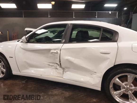 ✅ 2013 Dodge Charger RT Plus • VIN: 2C3CDXDT4DH537913 • Lot: 41583876. Listed on IAAI with 90,648 mi. Free auction sales archive from the USA and detailed vehicle history report at DreamBid. Image 6.