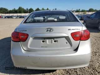 2007 Hyundai Elantra GLS z VIN KMHDU46D47U208789, wystawiony jako Copart lot #75377814 z przebiegiem 192 661 mil mil oraz Szkoda całkowita • Salvage title. Historia ofert i sprzedaży dostępna na DreamBid. Obrazek 6.