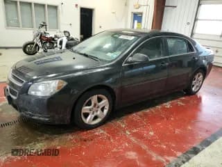✅ 2010 Chevrolet Malibu 1LS • VIN: 1G1ZB5EBXAF215031 • Lot: 84895654. Listed on Copart with 115,639 mi. Free auction sales archive from the USA and detailed vehicle history report at DreamBid. Image 1.