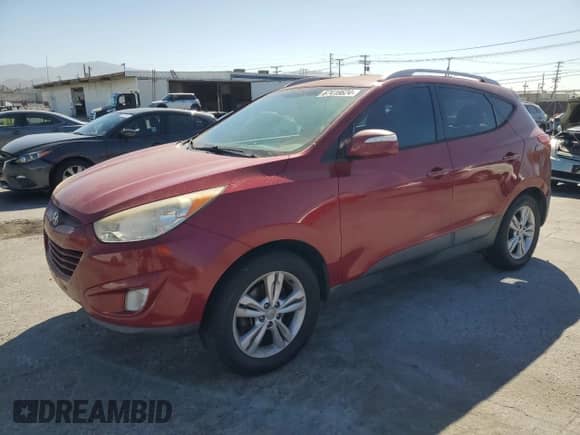 2013 Hyundai Tucson GLS z VIN KM8JU3AC3DU727193, wystawiony jako Copart lot #67418624 z przebiegiem 163 123 mil mil oraz Czysty tytuł • Clean title. Historia ofert i sprzedaży dostępna na DreamBid. Obrazek 1.