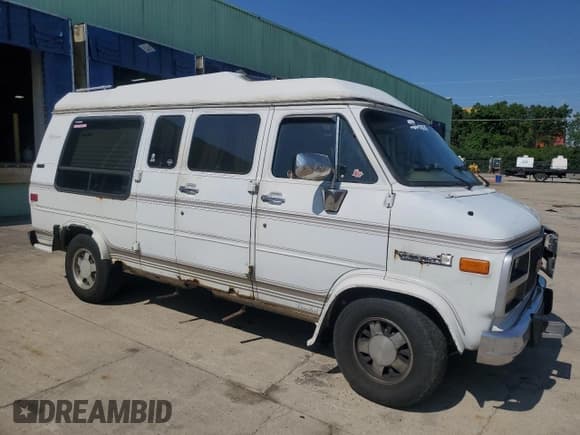 ✅ 1992 GMC Vandura • VIN: 1GDEG25KXN7507229 • Lot: 61733795. Wystawiony na Copart z przebiegiem 167 205 mil. Bezpłatny archiwum sprzedaży aukcyjnych z USA i szczegółowy raport historii pojazdu na DreamBid. Zdjęcie 4.