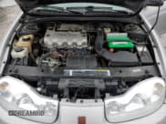 ✅ 2001 Saturn SC • VIN: 1G8ZP12881Z289924 • Лот: 90856305. Опубликован ранее на Copart с пробегом 99 502 миль. Бесплатный доступ к архиву аукционных продаж из США и подробный отчёт об истории автомобиля на DreamBid. Изображение 11.