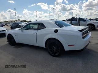✅ 2022 Dodge Challenger R/T Scat Pack Widebody • VIN: 2C3CDZFJXNH261049 • Lot: 73869024. Wystawiony na Copart z przebiegiem Nie podano. Bezpłatny archiwum sprzedaży aukcyjnych z USA i szczegółowy raport historii pojazdu na DreamBid. Zdjęcie 2.