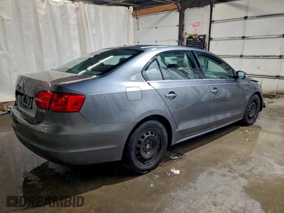 ✅ 2013 Volkswagen Jetta SE • VIN: 3VWDP7AJ5DM281922 • Lot: 94458235. Listed on Copart with 163,654 mi. Free auction sales archive from the USA and detailed vehicle history report at DreamBid. Image 3.