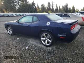 2014 Dodge Challenger SXT z VIN 2C3CDYAG3EH101729, wystawiony jako Copart lot #73331604 z przebiegiem 127 406 mil mil oraz Szkoda całkowita • Salvage title. Historia ofert i sprzedaży dostępna na DreamBid. Obrazek 2.