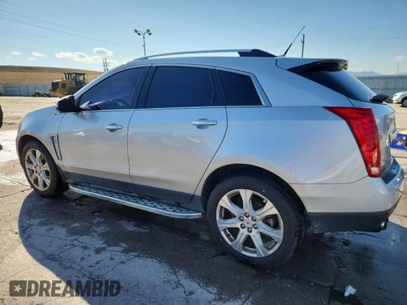 ✅ 2014 Cadillac SRX Premium Collection • VIN: 3GYFNGE37ES537496 • Lot: 81658775. Listed on Copart with 153,730 mi. Free auction sales archive from the USA and detailed vehicle history report at DreamBid. Image 2.