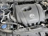 ✅ 2021 Mazda 3 Select • VIN: JM1BPBBL3M1326981 • Lot: 85912865. Listed on Copart with 52,677 mi. Free auction sales archive from the USA and detailed vehicle history report at DreamBid. Image 16.