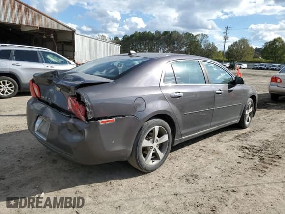 ✅ 2012 Chevrolet Malibu 1LT • VIN: 1G1ZC5E01CF338568 • Lot: 81255564. Listed on Copart with 164,276 mi. Free auction sales archive from the USA and detailed vehicle history report at DreamBid. Image 3.