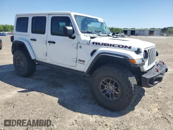 ✅ 2022 Jeep Wrangler Unlimited Rubicon • VIN: 1C4JJXFG0NW127415 • Lot: 52253935. Listed on Copart with 36,988 mi. Free auction sales archive from the USA and detailed vehicle history report at DreamBid. Image 4.
