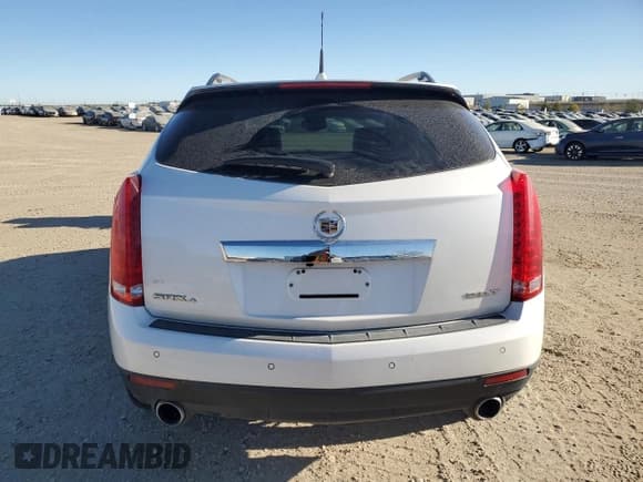 ✅ 2011 Cadillac SRX Turbo Premium Collection • VIN: 3GYFNFE60BS541843 • Lot: 82125425. Wystawiony na Copart z przebiegiem 181 268 mil. Bezpłatny archiwum sprzedaży aukcyjnych z USA i szczegółowy raport historii pojazdu na DreamBid. Zdjęcie 6.