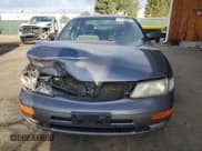 ✅ 1999 Nissan Maxima GXE • VIN: JN1CA21D8XT803822 • Lot: 64638365. Wystawiony na Copart z przebiegiem 203 700 mil. Bezpłatny archiwum sprzedaży aukcyjnych z USA i szczegółowy raport historii pojazdu na DreamBid. Zdjęcie 5.