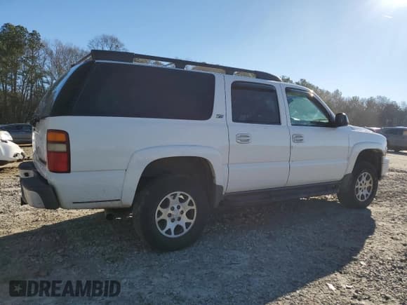 ✅ 2003 Chevrolet Suburban Z71 • VIN: 3GNFK16Z03G137883 • Лот: 87057554. Опубликован ранее на Copart с пробегом Не указан. Бесплатный доступ к архиву аукционных продаж из США и подробный отчёт об истории автомобиля на DreamBid. Изображение 3.