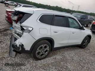 ✅ 2023 BMW X1 xDrive28i • VIN: WBX73EF02P5W79344 • Lot: 56465294. Listed on Copart with 33,642 mi. Free auction sales archive from the USA and detailed vehicle history report at DreamBid. Image 3.