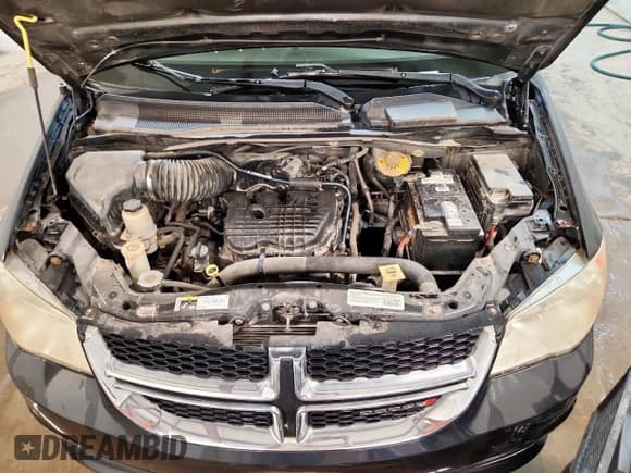 ✅ 2014 Dodge Grand Caravan SXT • VIN: 2C4RDGCG0ER244791 • Лот: 92697935. Опубликован ранее на Copart с пробегом 107 724 миль. Бесплатный доступ к архиву аукционных продаж из США и подробный отчёт об истории автомобиля на DreamBid. Изображение 12.