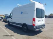 ✅ 2015 Ford Transit Cargo • VIN: 1FTNR2XM9FKA18848 • Lot: 42218203. Listed on IAAI with 162,184 mi. Free auction sales archive from the USA and detailed vehicle history report at DreamBid. Image 3.