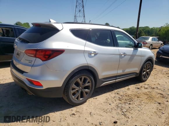 ✅ 2017 Hyundai Santa Fe Ultimate • VIN: 5XYZW4LA4HG482088 • Лот: 52152604. Опубликован ранее на Copart с пробегом 106 923 миль. Бесплатный доступ к архиву аукционных продаж из США и подробный отчёт об истории автомобиля на DreamBid. Изображение 3.