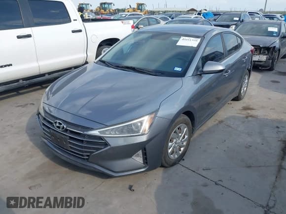 ✅ 2019 Hyundai Elantra SE • VIN: KMHD74LF1KU881660 • Lot: 43251260. Listed on IAAI with 129,793 mi. Free auction sales archive from the USA and detailed vehicle history report at DreamBid. Image 2.