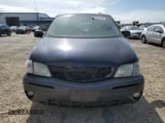 ✅ 2004 Pontiac Montana • VIN: 1GMDU03E94D196852 • Lot: 57477115. Listed on Copart with Not provided. Free auction sales archive from the USA and detailed vehicle history report at DreamBid. Image 5.