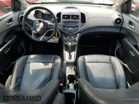 2012 Chevrolet Sonic LTZ с VIN 1G1JE5SH3C4140930, выставлен на аукционе Copart как лот 59429075 с пробегом 101 740 миль миль и Чистый • Clean title. История ставок и продаж доступна на DreamBid. Изображение 8.