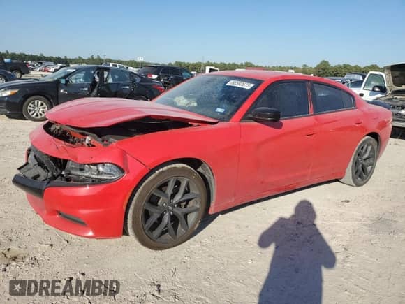 2019 Dodge Charger SXT with VIN 2C3CDXBG0KH713679, listed as a Copart auction lot 86592675 with 75,201 mi miles and Salvage title. Bid and sale history available at DreamBid. Image 1.