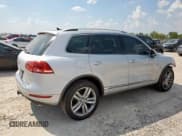 ✅ 2013 Volkswagen Touareg Sport • VIN: WVGEP9BP0DD013339 • Лот: 82204715. Опубликован ранее на Copart с пробегом 159 425 миль. Бесплатный доступ к архиву аукционных продаж из США и подробный отчёт об истории автомобиля на DreamBid. Изображение 3.