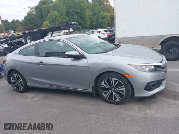 ✅ 2016 Honda Civic EX-L • VIN: 2HGFC3B7XGH354015 • Лот: 43195504. Опубликован ранее на IAAI с пробегом 55 027 миль. Бесплатный доступ к архиву аукционных продаж из США и подробный отчёт об истории автомобиля на DreamBid. Изображение 13.