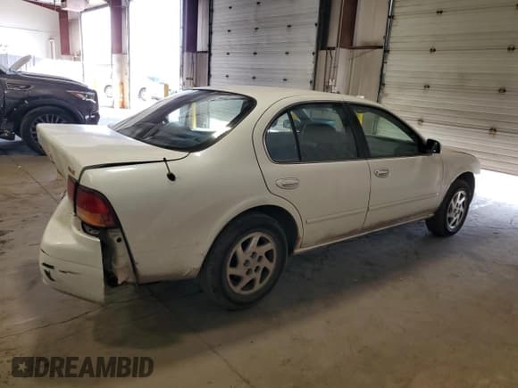 ✅ 1999 Nissan Maxima GXE • VIN: JN1CA21A6XT100211 • Lot: 78516634. Listed on Copart with 102,344 mi. Free auction sales archive from the USA and detailed vehicle history report at DreamBid. Image 3.
