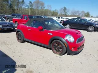 ✅ 2013 MINI Roadster S • VIN: WMWSY3C50DT594004 • Lot: 41894456. Listed on IAAI with 131,335 mi. Free auction sales archive from the USA and detailed vehicle history report at DreamBid. Image 1.