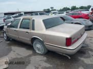 ✅ 1997 Lincoln Town Car Signature • VIN: 1LNLM82W9VY742564 • Lot: 42338729. Listed on IAAI with 206,178 mi. Free auction sales archive from the USA and detailed vehicle history report at DreamBid. Image 3.