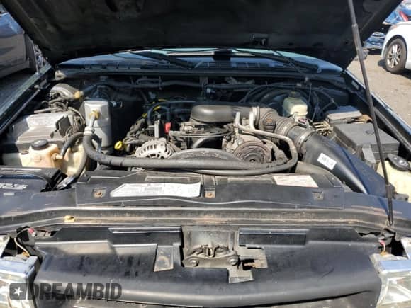 2003 Chevrolet Blazer LS z VIN 1GNCT18XX3K171656, wystawiony jako Copart lot #68950285 z przebiegiem 530 330 mil mil oraz Nie do naprawy • Non repairable. Historia ofert i sprzedaży dostępna na DreamBid. Obrazek 12.