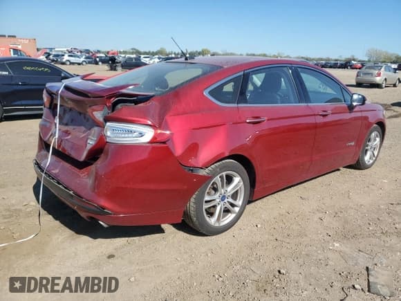 ✅ 2016 Ford Fusion Titanium Hybrid • VIN: 3FA6P0RU3GR127210 • Lot: 82348345. Wystawiony na Copart z przebiegiem 87 833 mil. Bezpłatny archiwum sprzedaży aukcyjnych z USA i szczegółowy raport historii pojazdu na DreamBid. Zdjęcie 3.