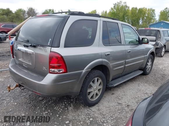 ✅ 2005 Buick Rainier CXL • VIN: 5GADT13S552250519 • Lot: 43316264. Listed on IAAI with 183,195 mi. Free auction sales archive from the USA and detailed vehicle history report at DreamBid. Image 4.
