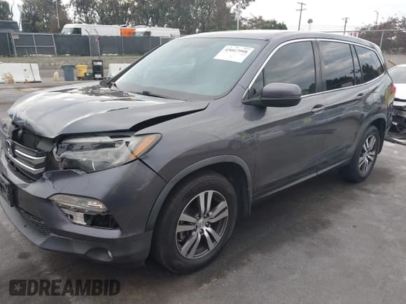 ✅ 2016 Honda Pilot EX-L • VIN: 5FNYF5H7XGB057012 • Lot: 43667998. Listed on IAAI with 110,591 mi. Free auction sales archive from the USA and detailed vehicle history report at DreamBid. Image 2.