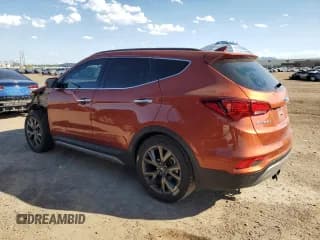 ✅ 2017 Hyundai Santa Fe Ultimate • VIN: 5XYZW4LA4HG465663 • Лот: 71105393. Опубликован ранее на Copart с пробегом 63 619 миль. Бесплатный доступ к архиву аукционных продаж из США и подробный отчёт об истории автомобиля на DreamBid. Изображение 2.