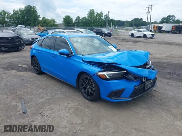 ✅ 2024 Honda Civic Sport Touring • VIN: 19XFL1G85RE019716 • Lot: 42748703. Wystawiony na IAAI z przebiegiem 5 879 mil. Bezpłatny archiwum sprzedaży aukcyjnych z USA i szczegółowy raport historii pojazdu na DreamBid. Zdjęcie 1.