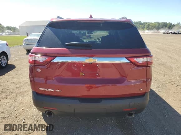 ✅ 2021 Chevrolet Traverse LT • VIN: 1GNEVHKW6MJ169289 • Lot: 70177504. Listed on Copart with 30,718 mi. Free auction sales archive from the USA and detailed vehicle history report at DreamBid. Image 6.