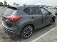 ✅ 2016 Mazda CX-5 Grand Touring • VIN: JM3KE2DY3G0792619 • Lot: 57322565. Wystawiony na Copart z przebiegiem 46 937 mil. Bezpłatny archiwum sprzedaży aukcyjnych z USA i szczegółowy raport historii pojazdu na DreamBid. Zdjęcie 3.