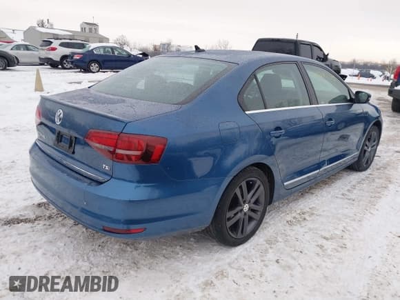 ✅ 2018 Volkswagen Jetta SEL • VIN: 3VWL17AJ6JM209328 • Lot: 41281285. Listed on IAAI with 103,428 mi. Free auction sales archive from the USA and detailed vehicle history report at DreamBid. Image 4.