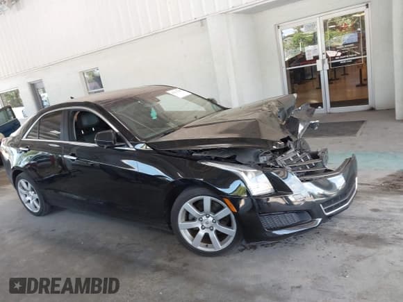 ✅ 2014 Cadillac ATS Standard RWD • VIN: 1G6AA5RA0E0171142 • Lot: 42871265. Listed on IAAI with 137,329 mi. Free auction sales archive from the USA and detailed vehicle history report at DreamBid. Image 13.