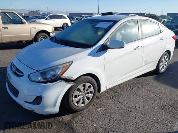 2015 Hyundai Accent GLS with VIN KMHCT4AE0FU927762, listed as a IAAI auction lot 43587608 with 128,365 mi miles and . Bid and sale history available at DreamBid. Image 2.