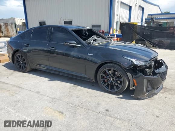 ✅ 2024 Cadillac CT5-V • VIN: 1G6DR5RW2R0121267 • Лот: 58037775. Опубликован ранее на Copart с пробегом 13 228 миль. Бесплатный доступ к архиву аукционных продаж из США и подробный отчёт об истории автомобиля на DreamBid. Изображение 4.