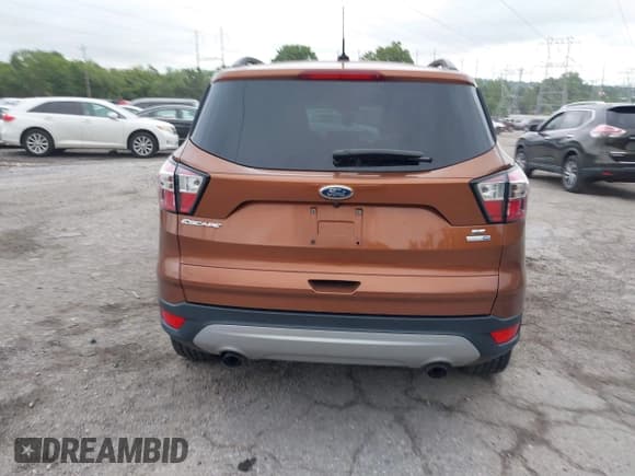 ✅ 2017 Ford Escape SE • VIN: 1FMCU9GD7HUD95311 • Lot: 42685526. Listed on IAAI with 95,785 mi. Free auction sales archive from the USA and detailed vehicle history report at DreamBid. Image 16.