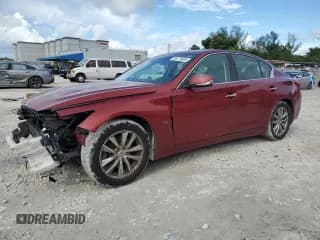 ✅ 2014 Infiniti Q50 • VIN: JN1BV7AP4EM682219 • Lot: 83778665. Listed on Copart with 96,205 mi. Free auction sales archive from the USA and detailed vehicle history report at DreamBid. Image 1.