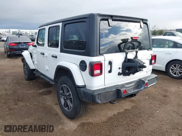 ✅ 2023 Jeep Wrangler Sahara • VIN: 1C4HJXEN7PW701607 • Лот: 41774580. Опубликован ранее на IAAI с пробегом 13 376 миль. Бесплатный доступ к архиву аукционных продаж из США и подробный отчёт об истории автомобиля на DreamBid. Изображение 3.