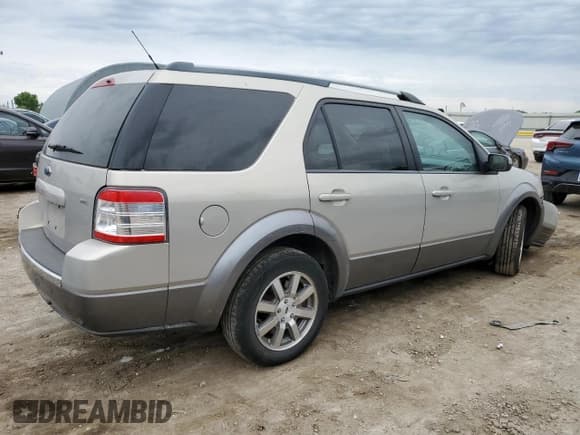 ✅ 2009 Ford Taurus X SEL • VIN: 1FMDK02W59GA02033 • Lot: 55994975. Wystawiony na Copart z przebiegiem 268 089 mil. Bezpłatny archiwum sprzedaży aukcyjnych z USA i szczegółowy raport historii pojazdu na DreamBid. Zdjęcie 3.