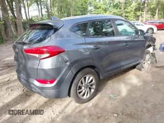 2018 Hyundai Tucson SEL z VIN KM8J33A42JU733994, wystawiony jako IAAI lot #42985978 z przebiegiem 164 545 mil mil oraz . Historia ofert i sprzedaży dostępna na DreamBid. Obrazek 4.
