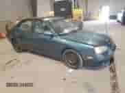 2003 Hyundai Elantra GLS z VIN KMHDN45D83U495806, wystawiony jako Copart lot #65962504 z przebiegiem 131 056 mil mil oraz Szkoda całkowita • Salvage title. Historia ofert i sprzedaży dostępna na DreamBid. Obrazek 4.
